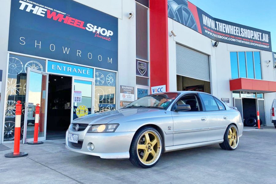 HOLDEN COMMODORE WITH GOLD SIMMONS FR1 WHEELS  |  | HOLDEN